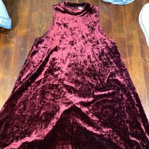 A strapless, haltered neck formal dress.